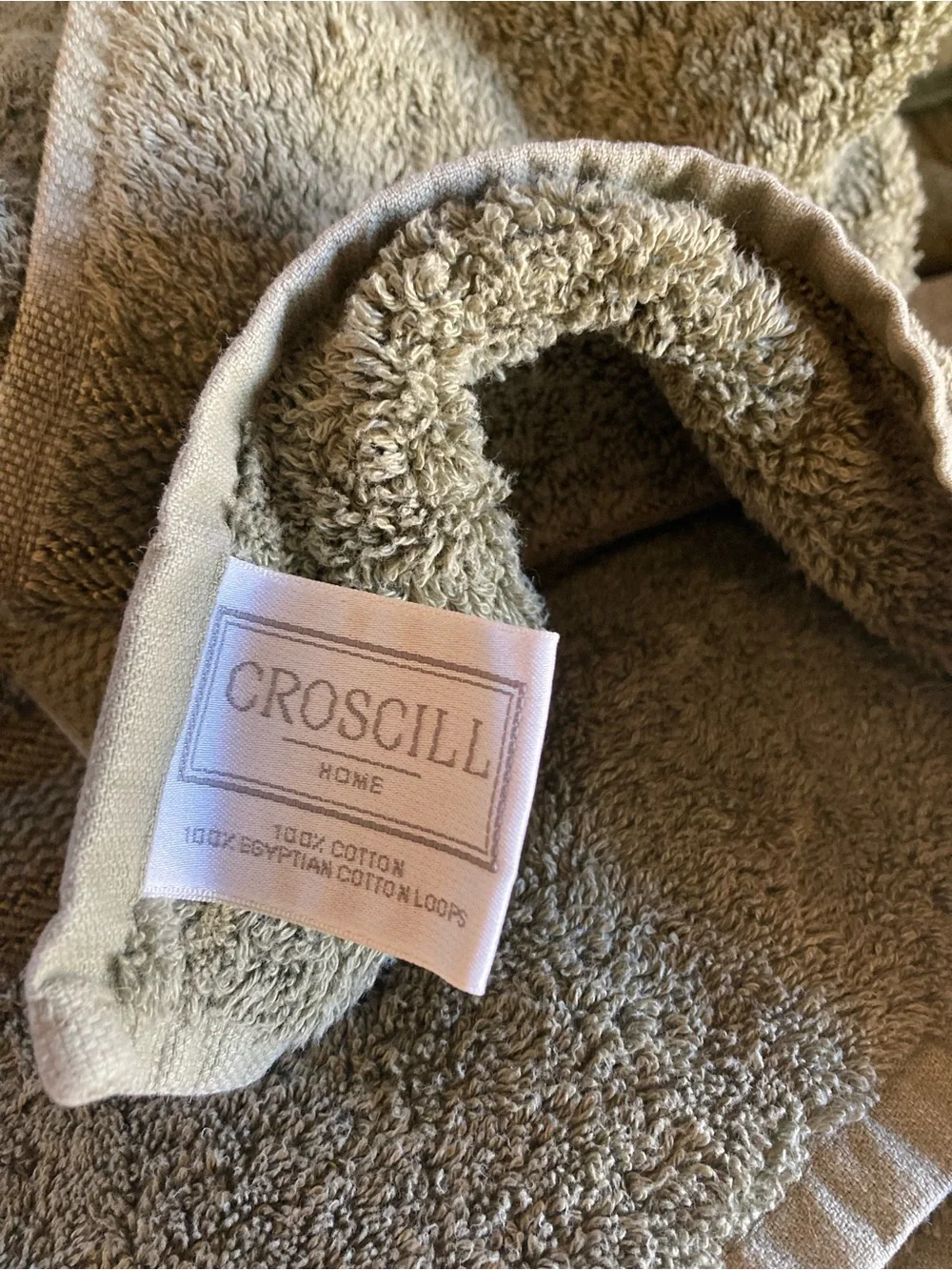 2 Croscill towels, 3 hand towels and 1 bath mat.